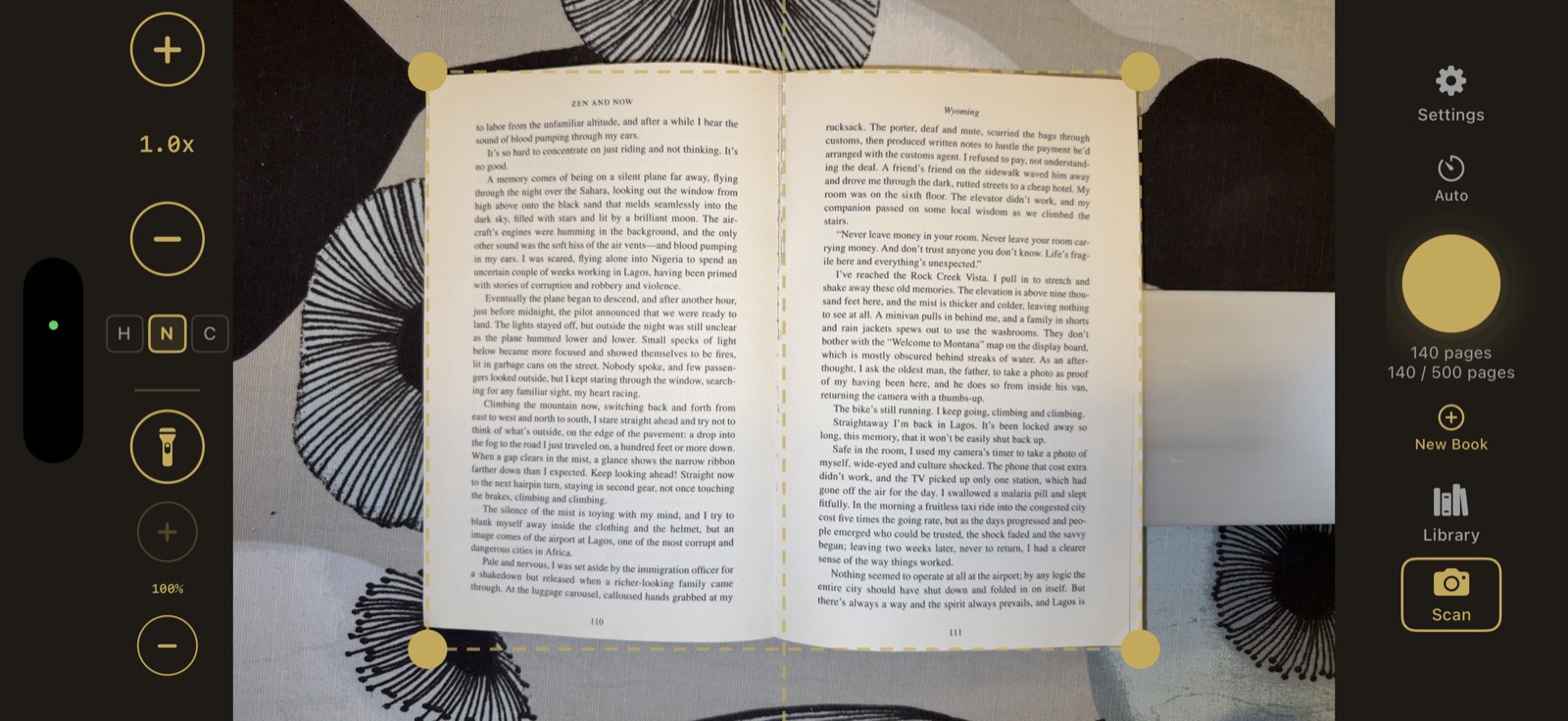 Knut Book Scanner scanning a novel with crop rectangle and center line visible